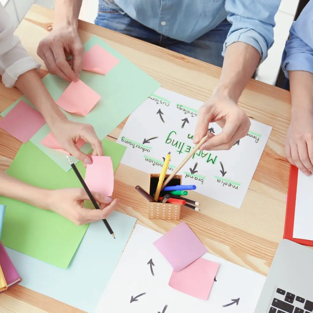 Group of employees going over a marketing strategy.